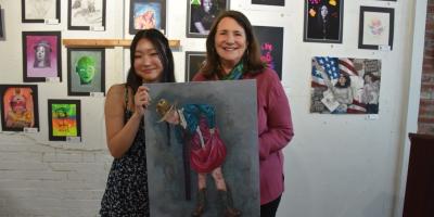 Rep. DeGette with Madison Lee and her winning piece of art.
