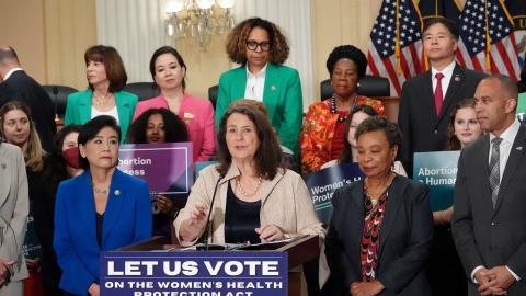 congresswoman Degette speaking at a podium