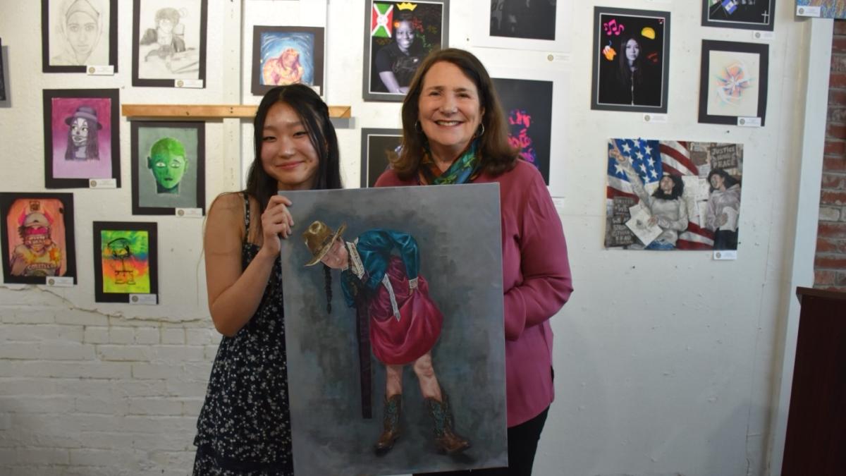 Rep. DeGette with Madison Lee and her winning piece of art.