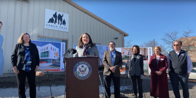 A photo of a press conference with Rep. DeGette and local leaders in front of Urban Peak in Denver, CO.